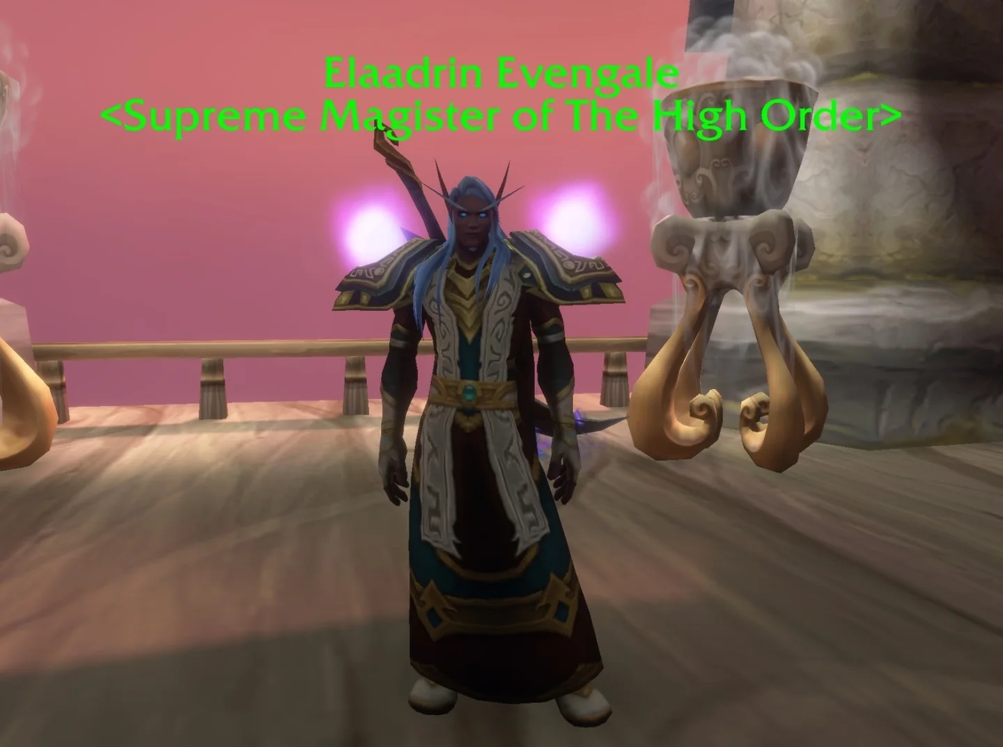 Elaadrin Evengale stands beneath his Supreme Magister of the High Order nameplate.