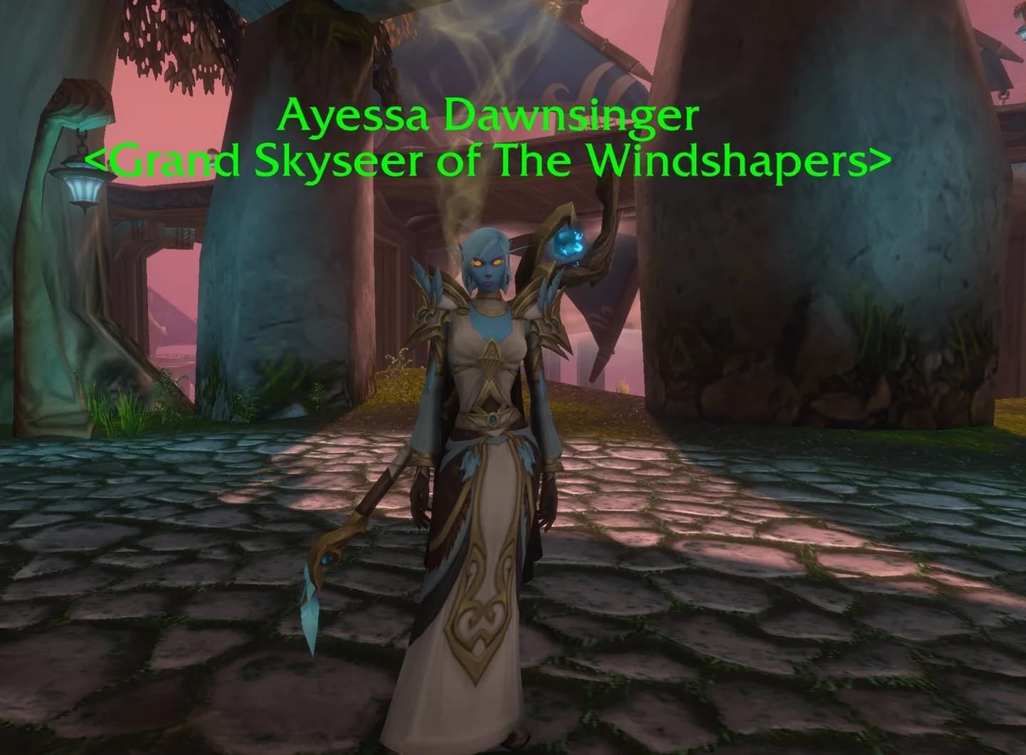 Ayessa Dawnsinger stands beneath her Grand Skyseer of the Windshapers nameplate.