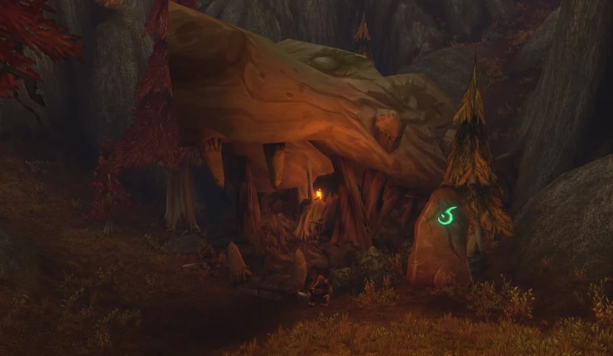 A furbolg beside a timber-framed cave entrance in the image shared by Josh Greenfield with his dungeon teaser.