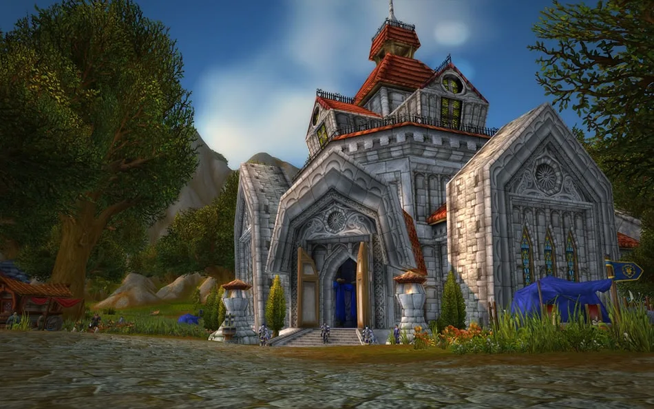 Northshire Abbey with Alliance banners and Elwynn trees — official legacy wow reference screenshot
